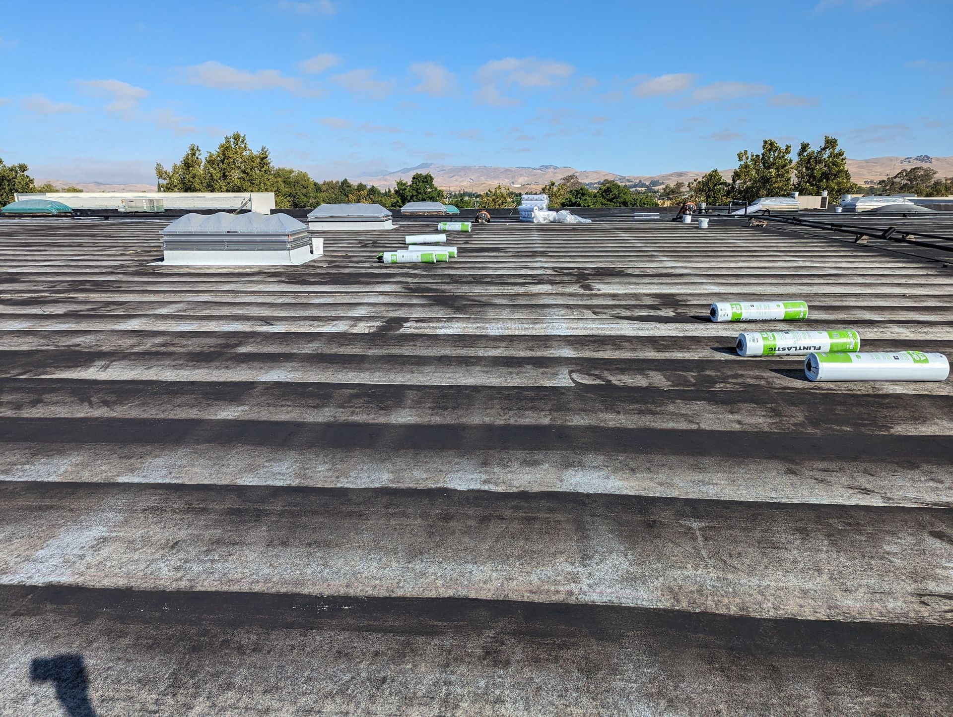 A roof with a lot of tubes on it