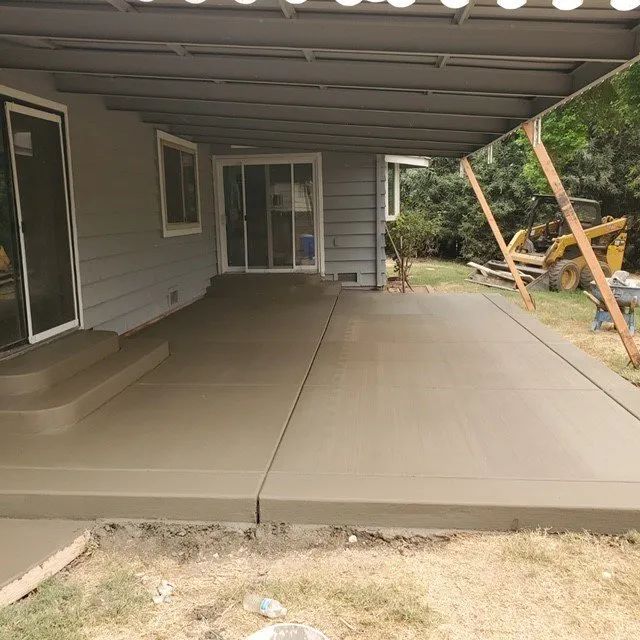 House with excavation equipment in backyard — Yuba City, CA — Superior Concrete Flatwork/HSCP