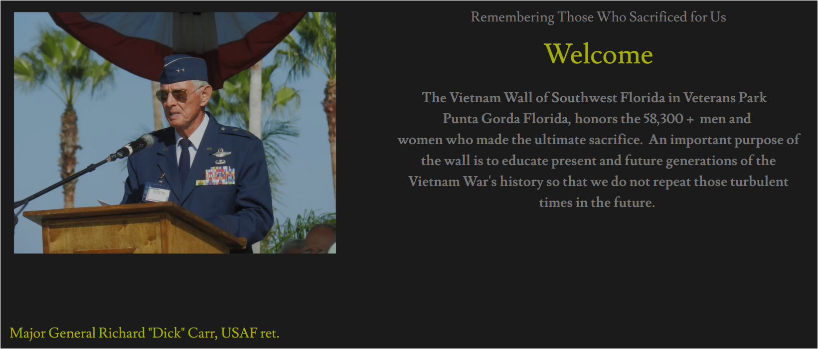 A US Air Force officer speaks at a podium in front of the Vietnam Wall of Southwest Florida in Punta Gorda.