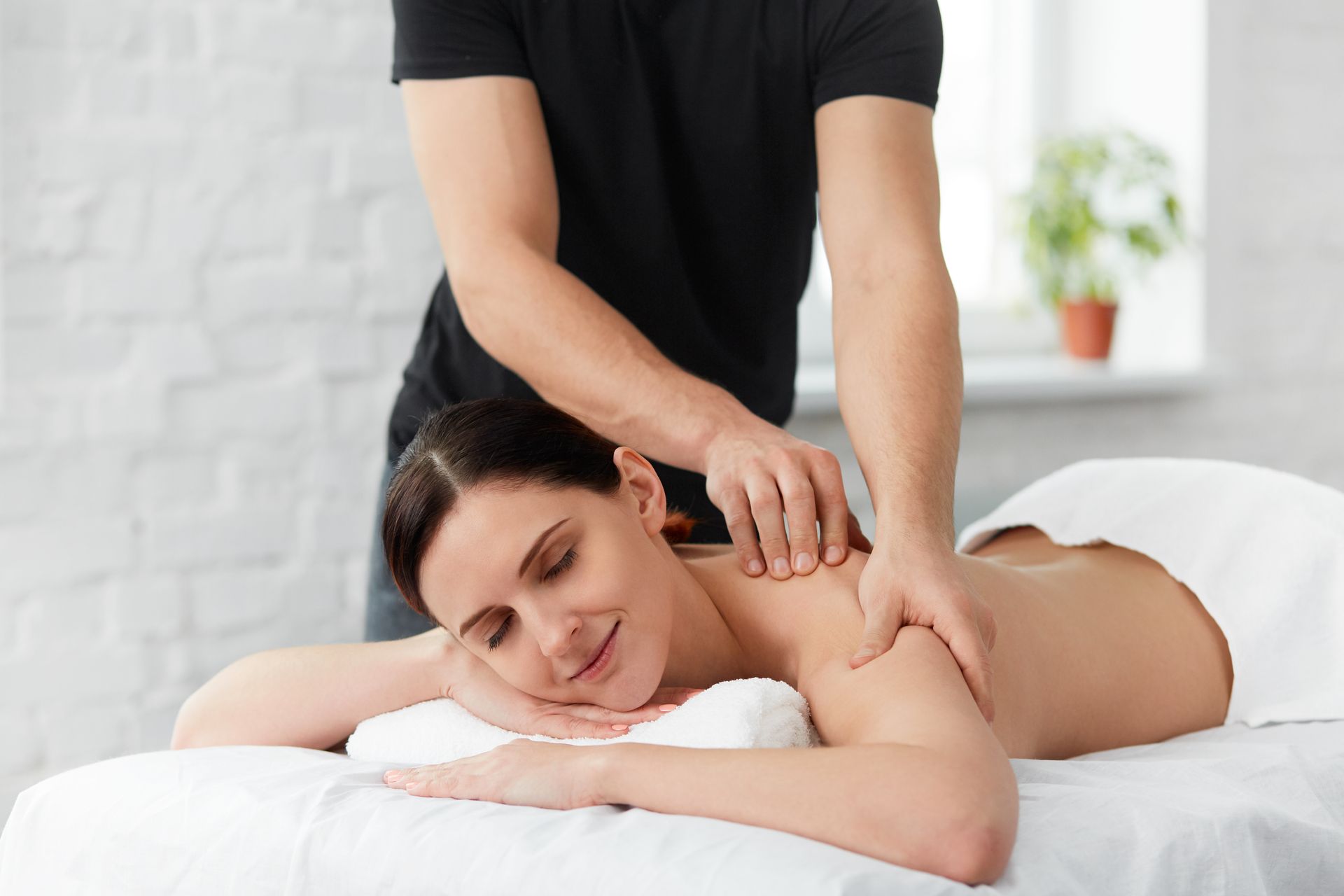 A lady enjoying a relaxing massage