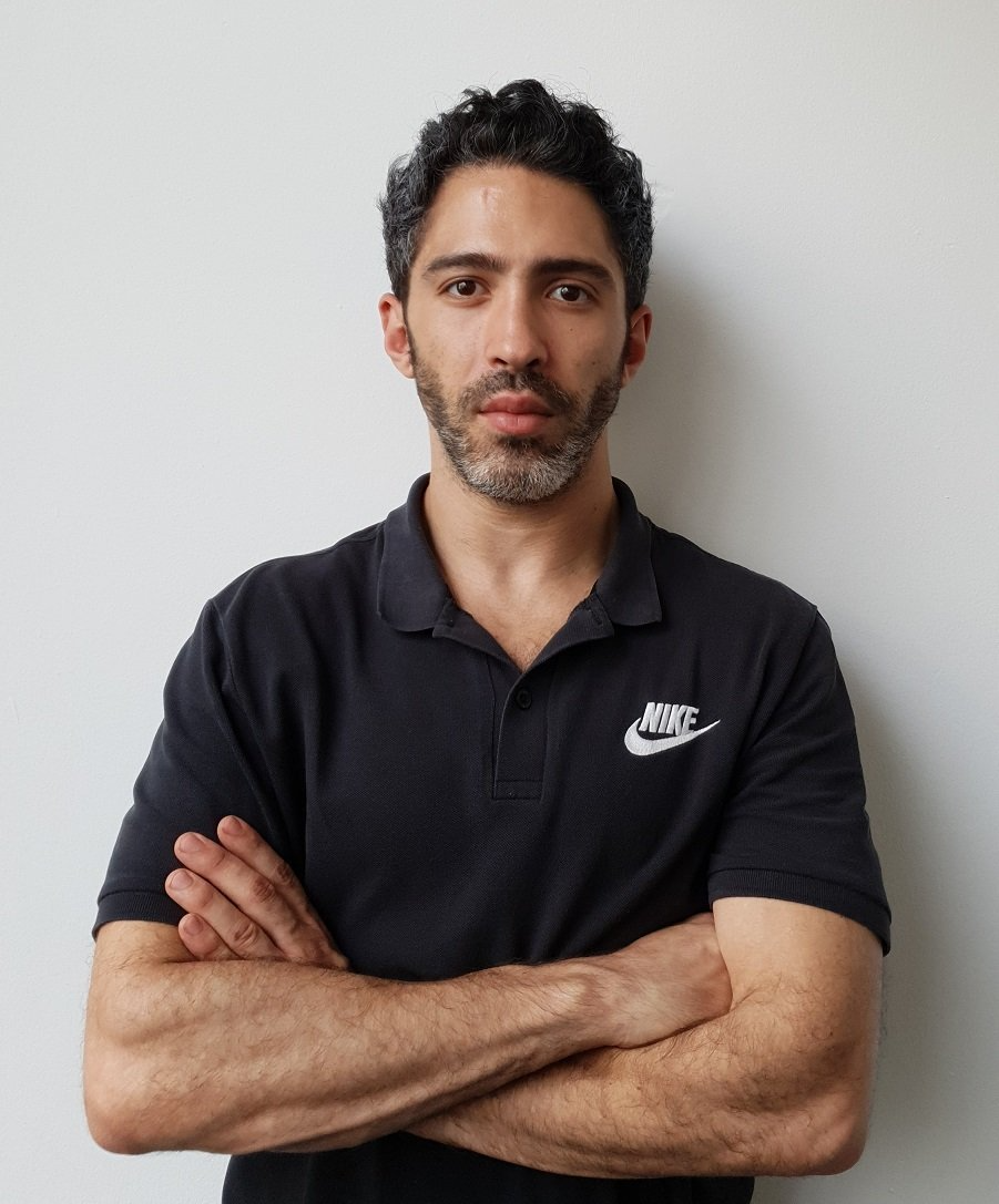 Portrait of Manil, who is a sports therapy and massage therpy expert working at Rehab Pro Sports Injuries and Wellness Clinic in Manchester City Centre.