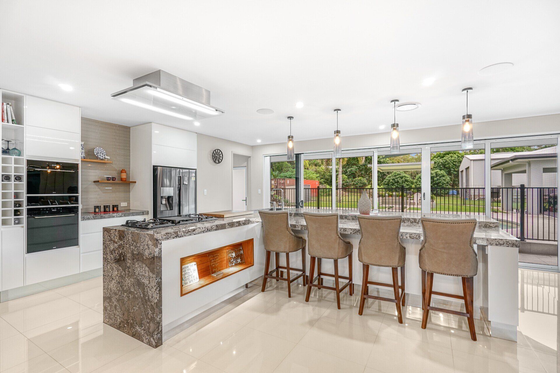 Sideview Of The Kitchen Area With Gray Countertop — Kitchen Design in Edmonton, QLD