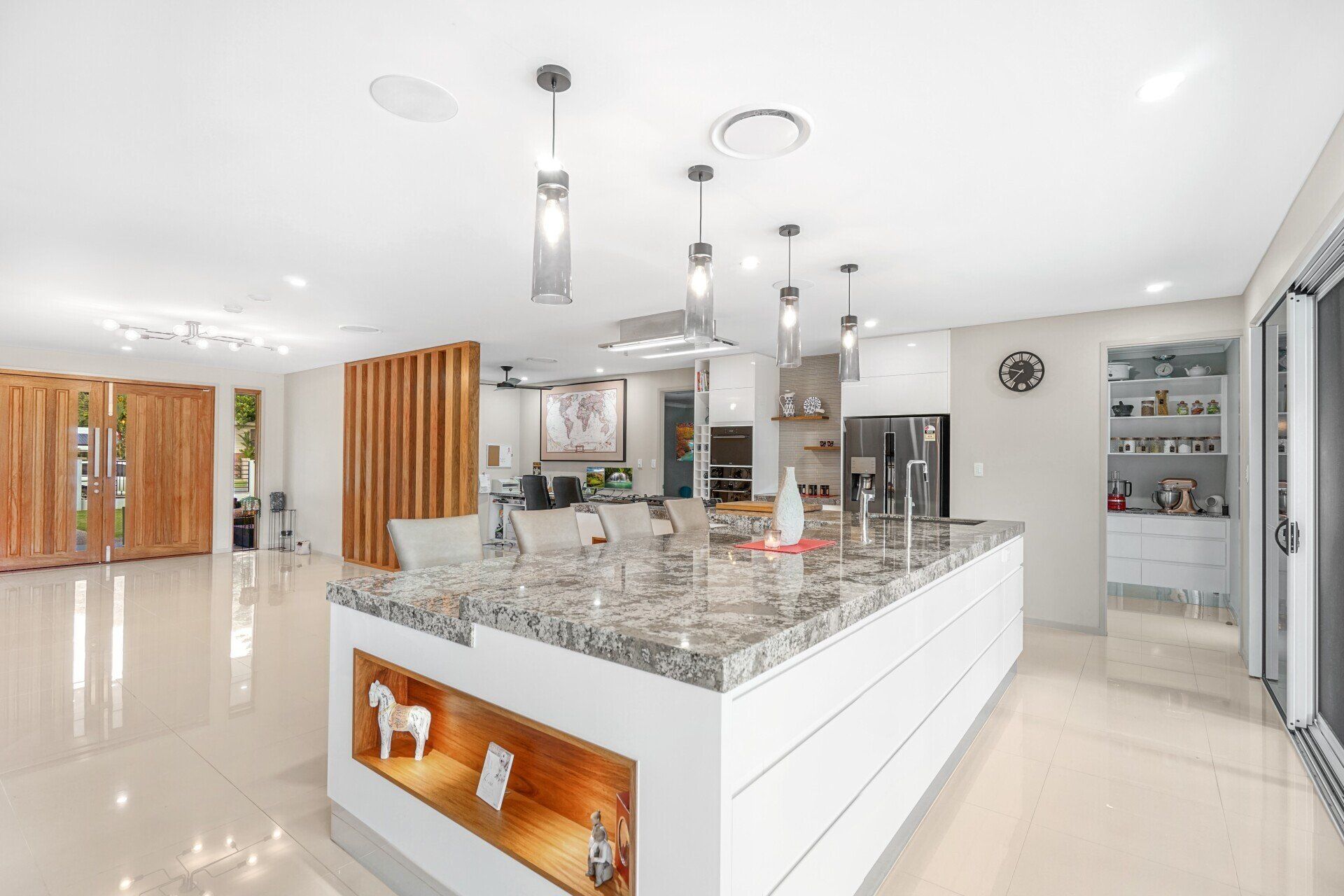 Kitchen Island With Granite Countertop — Kitchen Design in Edmonton, QLD