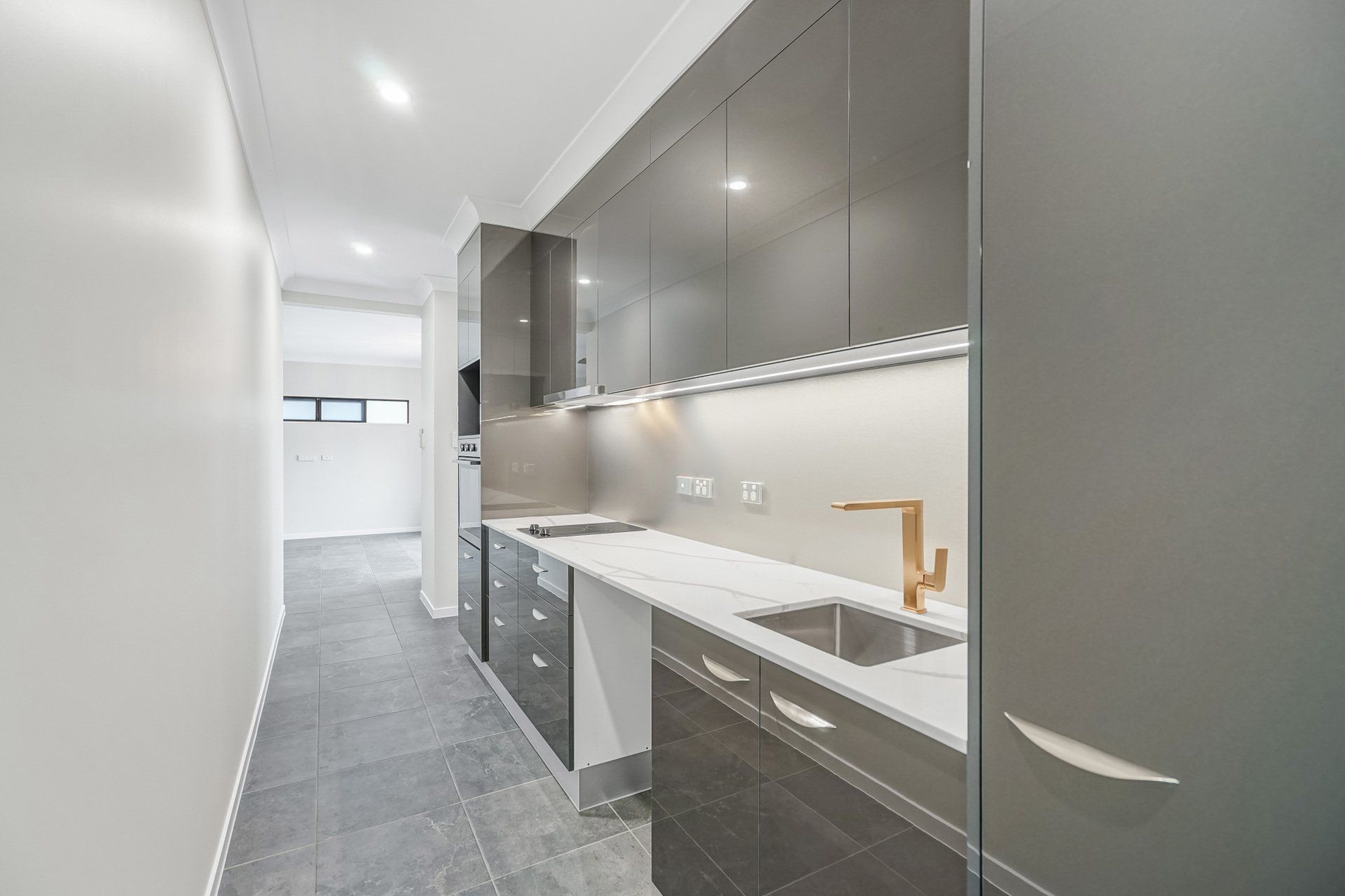 Renovated Kitchen With White Cabinets — Kitchen Design in Edmonton, QLD
