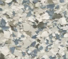 Textured surface with white, gray, and blue chips, likely for flooring or coating.