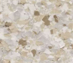 Cream-colored countertop with flecks of white and light brown.