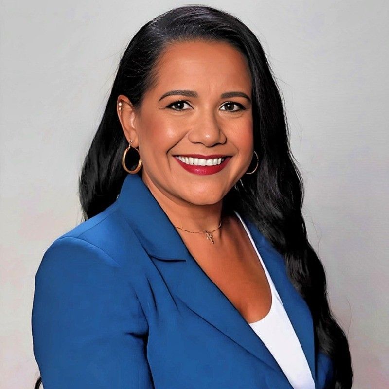 A person icon in a blue circle on a white background.