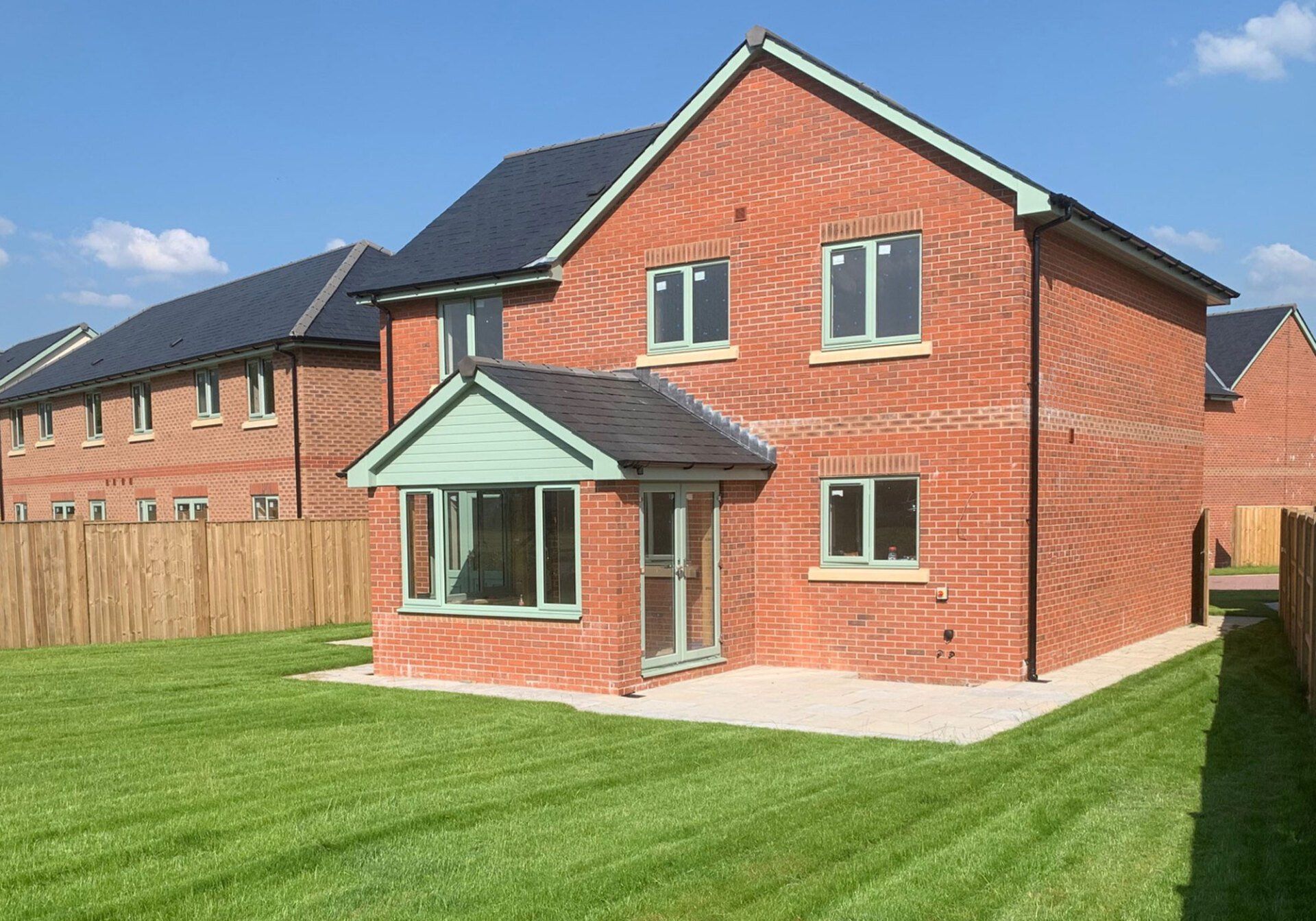 Rear view of Llandovery (plot 2), with a newly laid lawn.