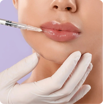 Close-up of person applying glossy pink lip color with a wand applicator. Pink background.