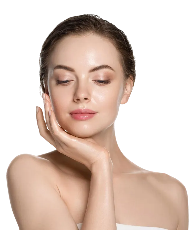 Woman with fair skin touches her face with a hand, eyes closed, against a white background.