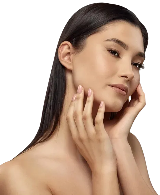 Woman with dark hair, touching her face with both hands, looking toward the viewer.