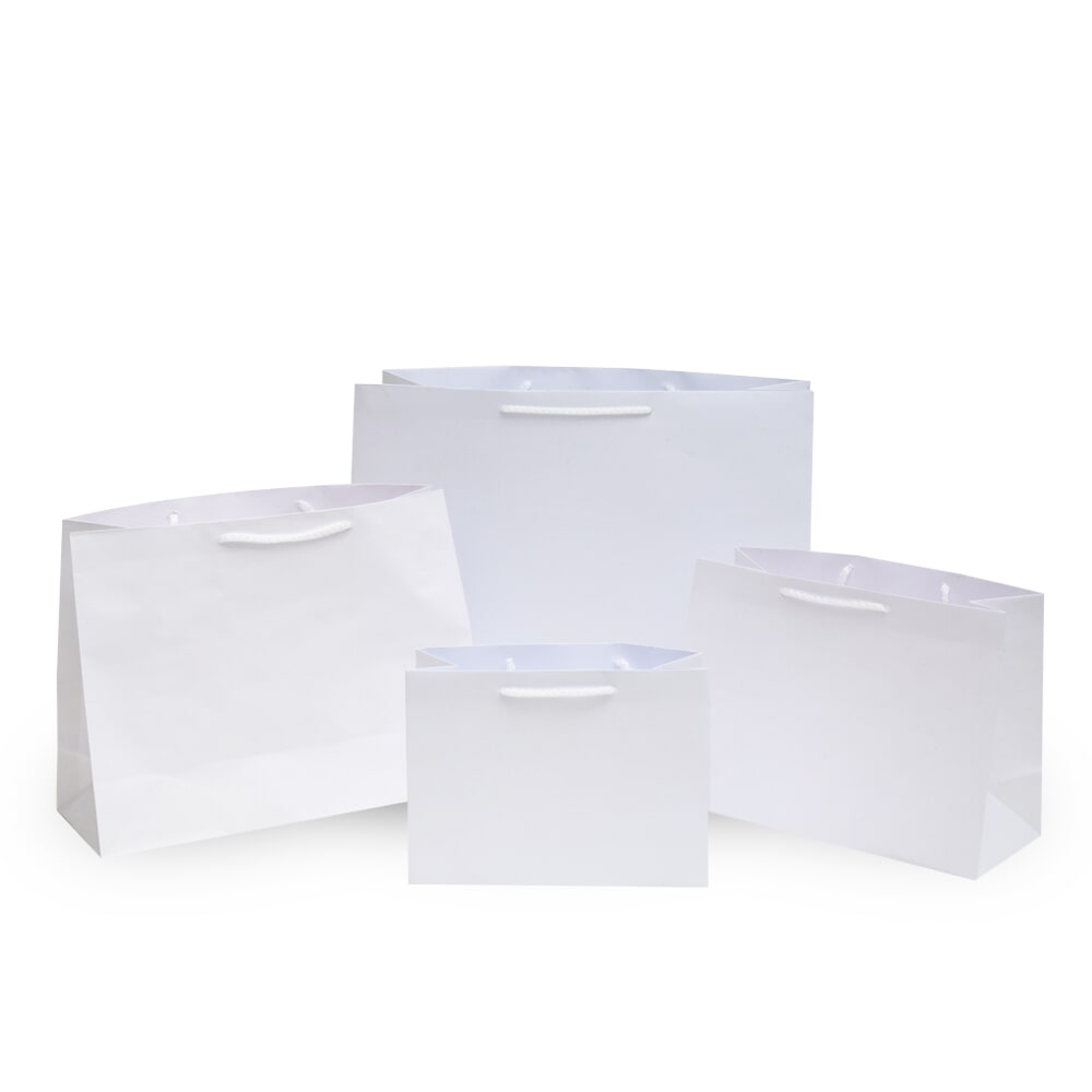 EL CENTRO BOLSERO S.A - bolsas bond blancas con asas de macrame tipo boutique