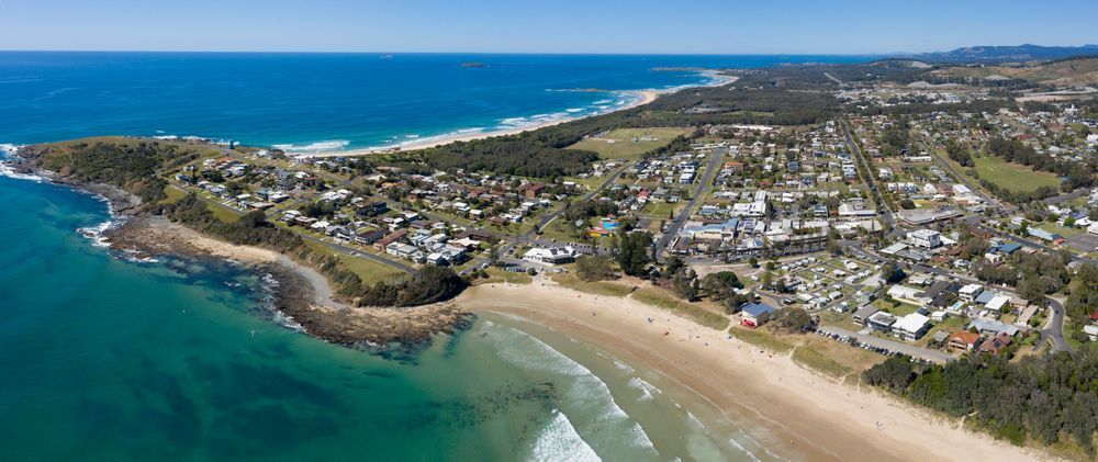 An Aerial View of a Woolgoolga Beach — Coffs Coast Antenna Services in Woolgoolga, NSW