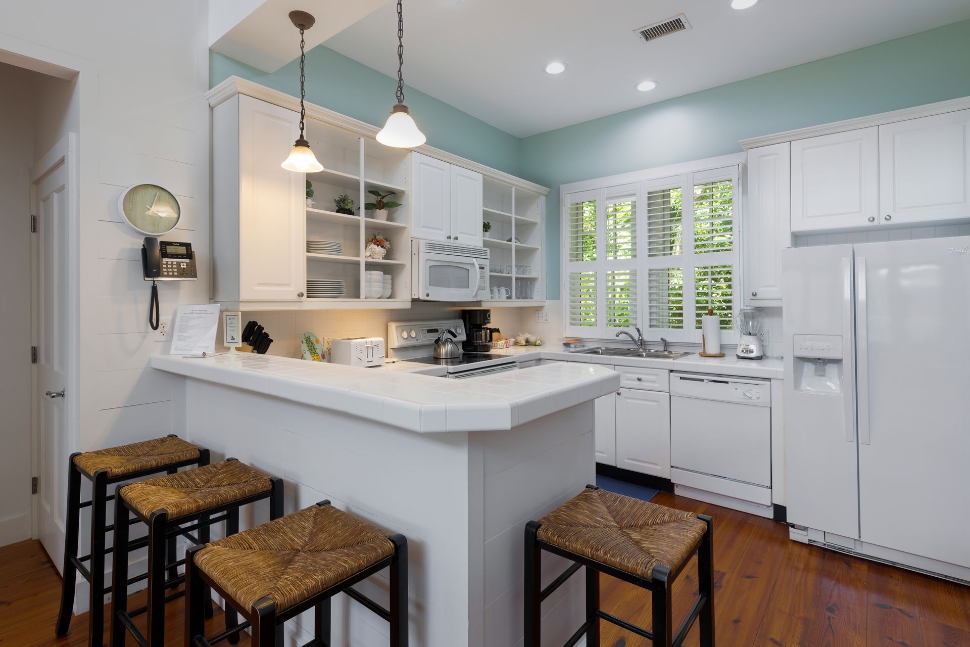 Full kitchen with all the necessary amenities and bar seating