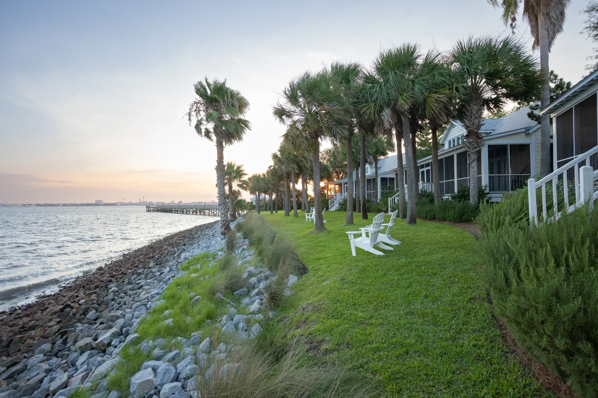 Harbor view cottages situated on a lawn overlooking the Charleston Harbor