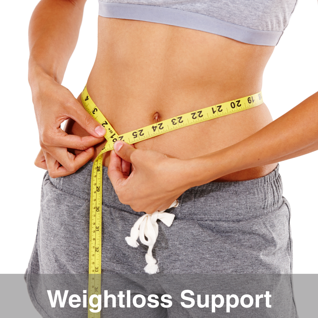 Woman measuring waist with a yellow tape measure, suggesting weight loss progress.