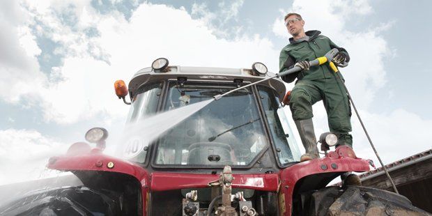 Cleaning The Tractor — Albany, OR — Sure-Clean NW Cleaning The Tractor — Albany, OR — Sure-Clean NW