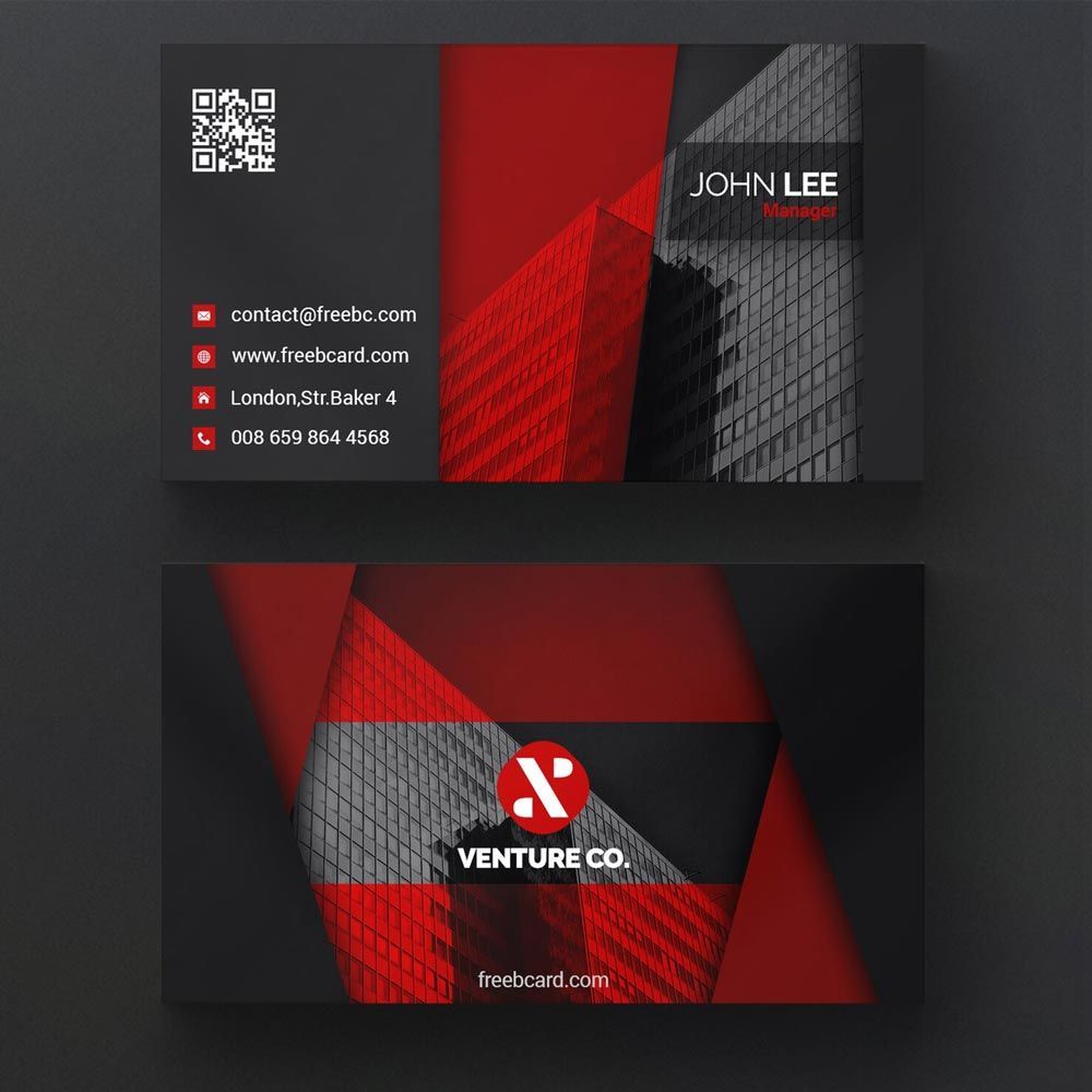 Business cards with a red and gray geometric design featuring a building.
