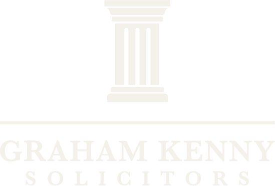 Logo of Graham Kenny Solicitors featuring a stylized column above the company name.