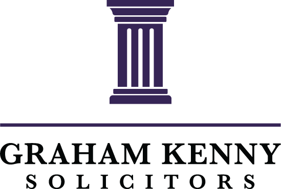 Purple and black logo of Graham Kenny Solicitors with a stylized column above the text.