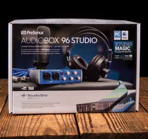 A box of presonus audiobox 96 studio sits on a wooden table