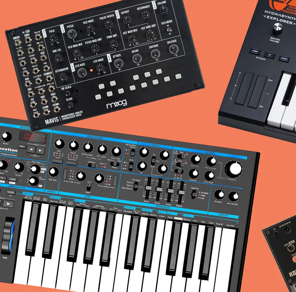 A keyboard and a mixer are on a table