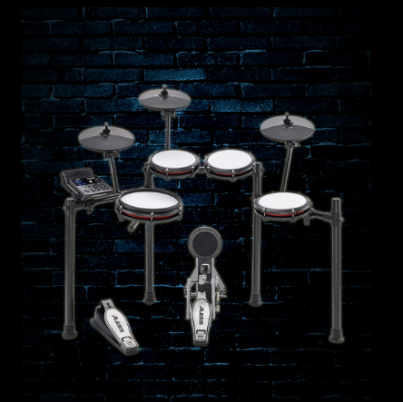 A red tama drum set against a brick wall