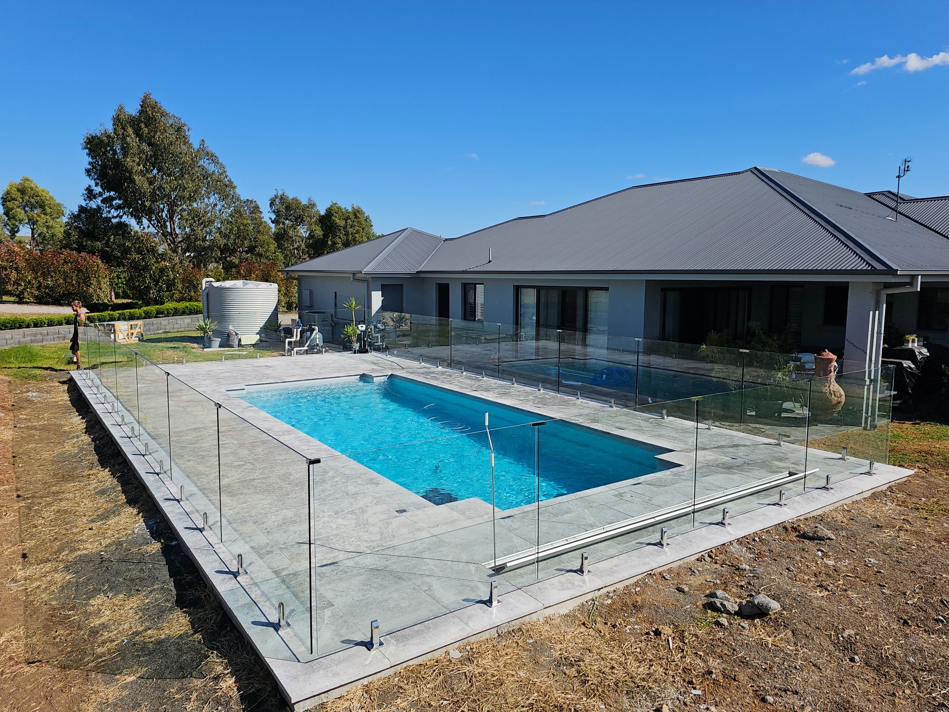 Cleaning a Pool — Pool Builder in Moore Creek, NSW