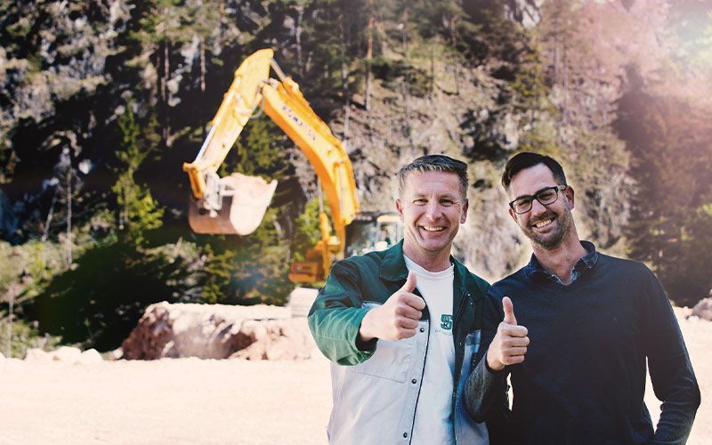 Employees in front of a construction site belonging to SSK Salzburger Sand & Kieswerke