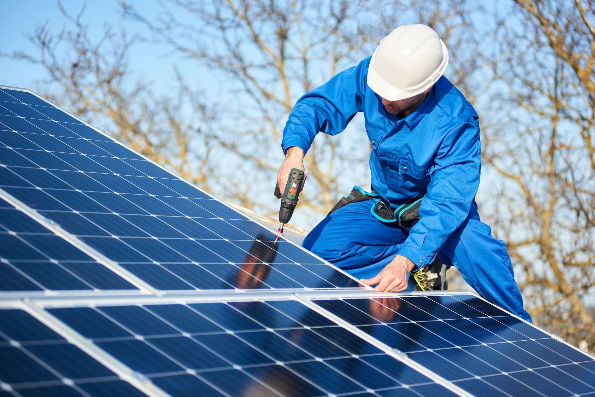 Man Installing Solar Panel — Danville, NH — Danville Solar Co