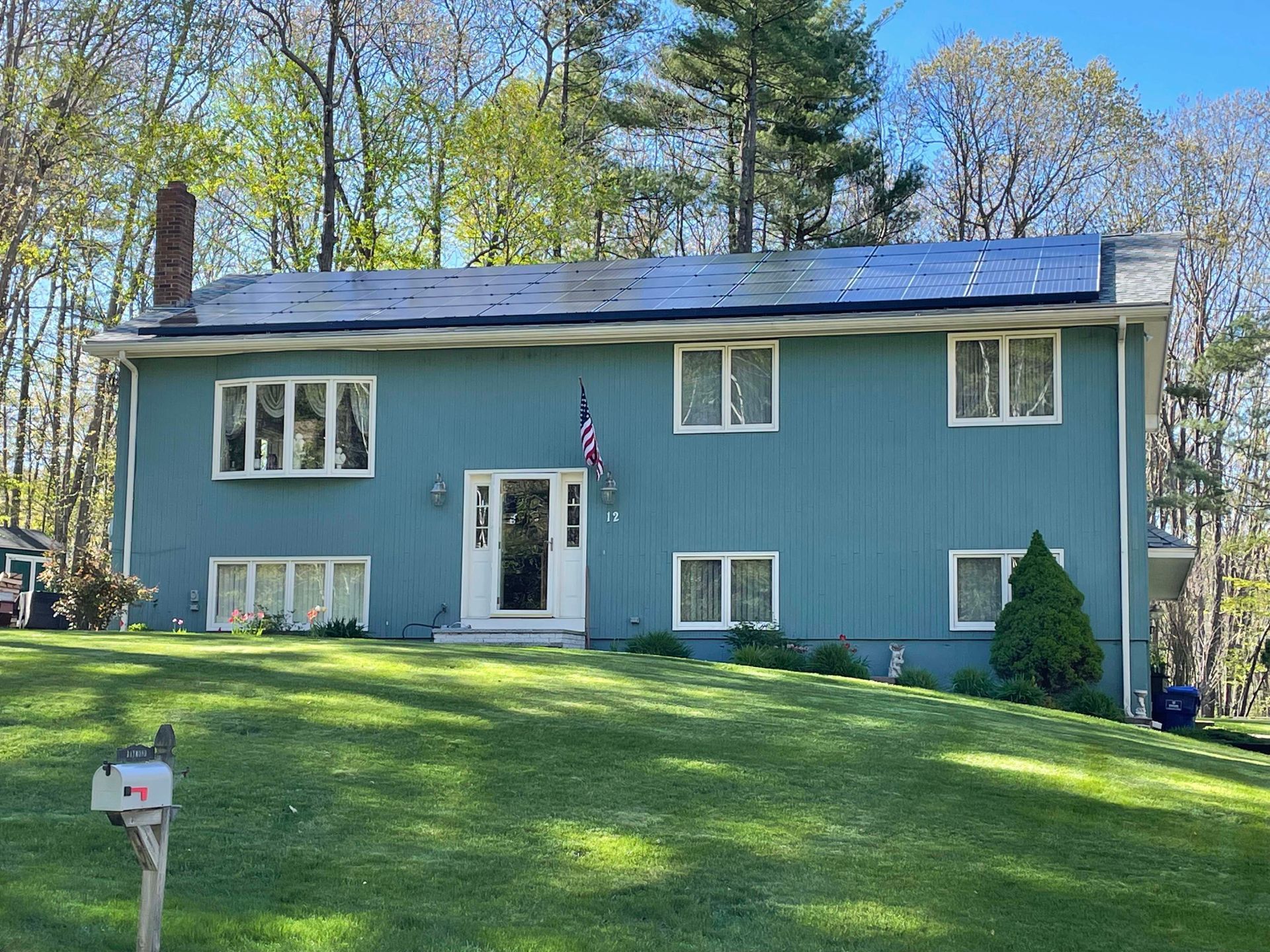 Blue House With Solar Panel — Danville, NH — Danville Solar Co