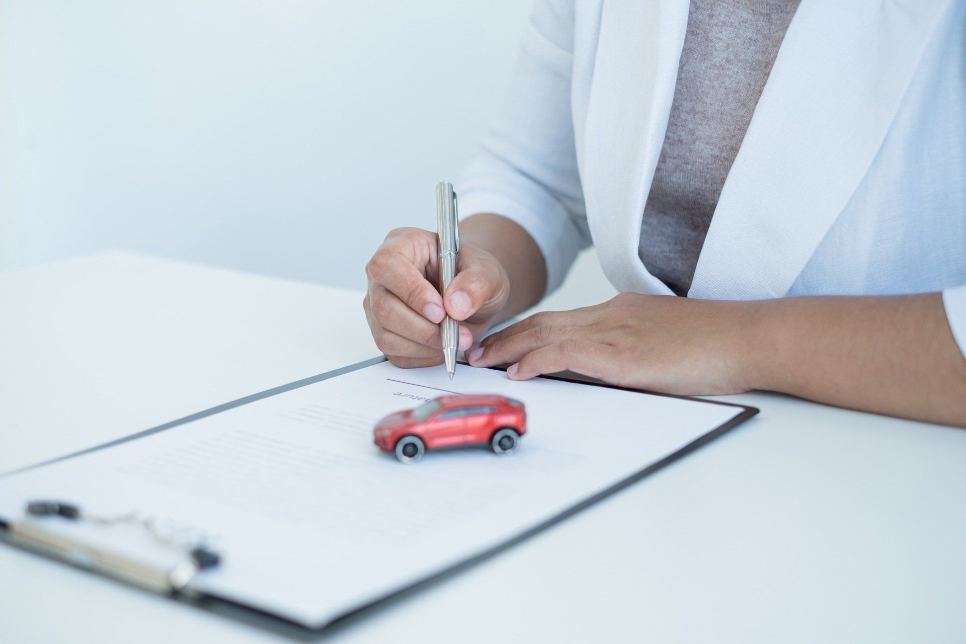 signing a car rental agreement