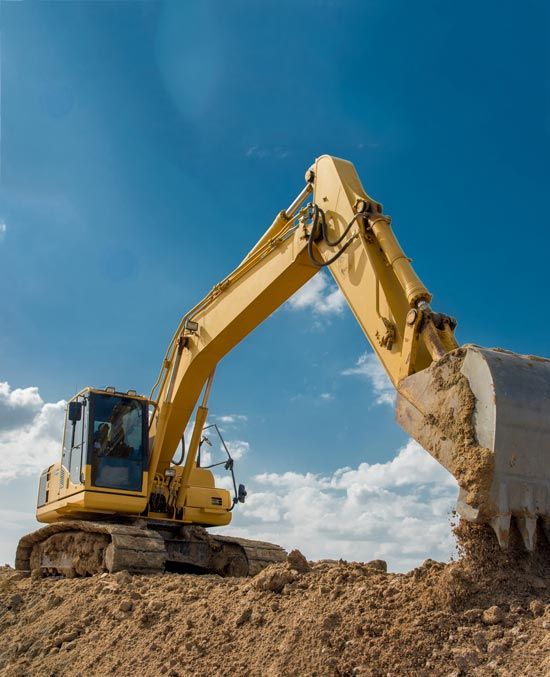 Contractors — Excavator Excavating Soil in Tyler, TX
