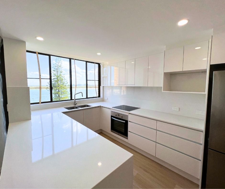 Modern White Kitchen With Large Windows — Nyblad Construction in Caloundra, QLD