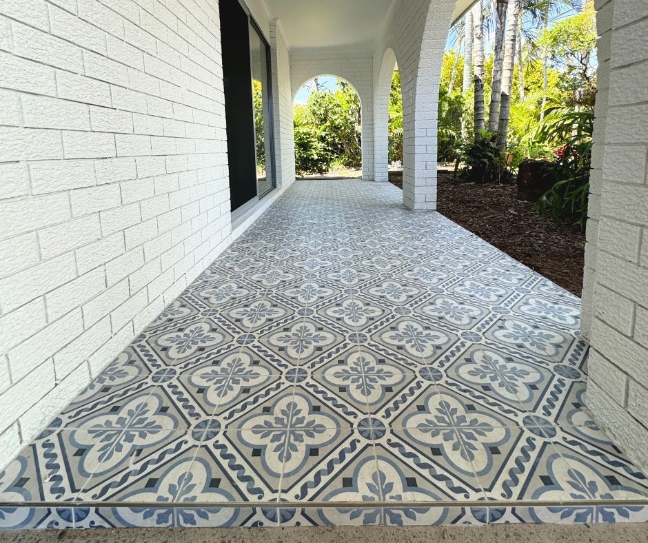 Porch With Patterned Blue and Grey Tile Flooring — Nyblad Construction in Maroochydore, QLD