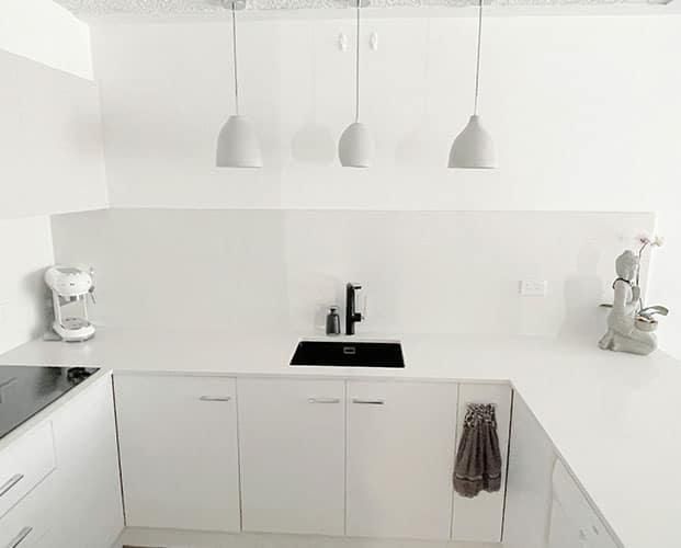 Kitchen With White Cabinets — Nyblad Construction in Caloundra West, QLD