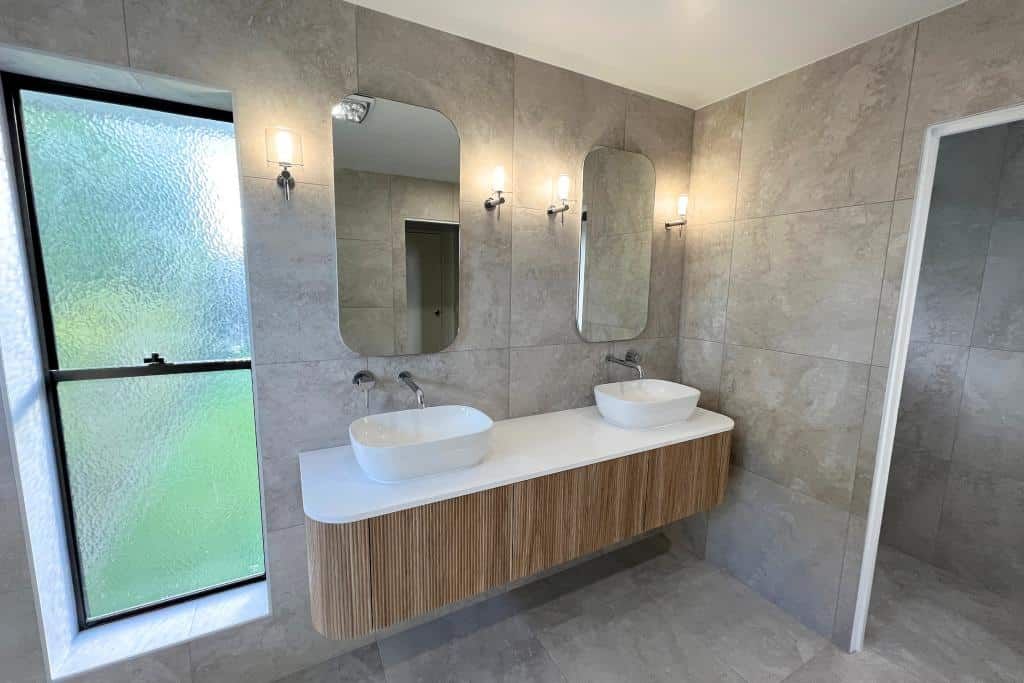 Bathroom With Two Sinks and Two Mirrors — Nyblad Construction in Caloundra West, QLD