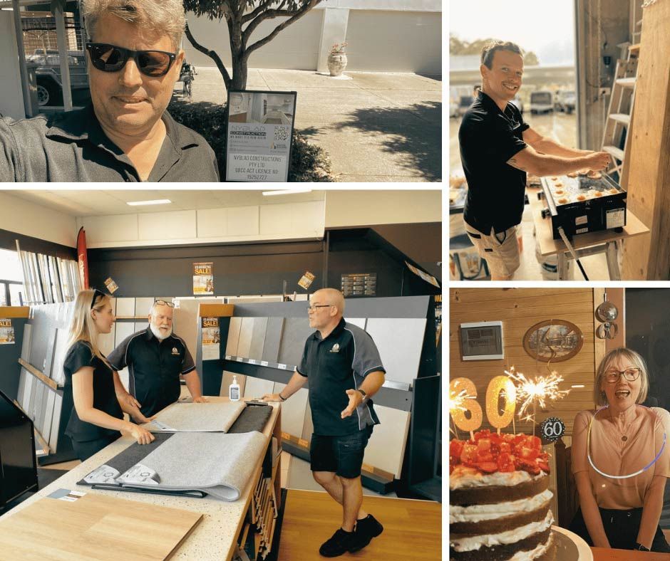 A Group Of People Are Standing Around A Table With A Cake In The Middle — Nyblad Construction in Caloundra West, QLD