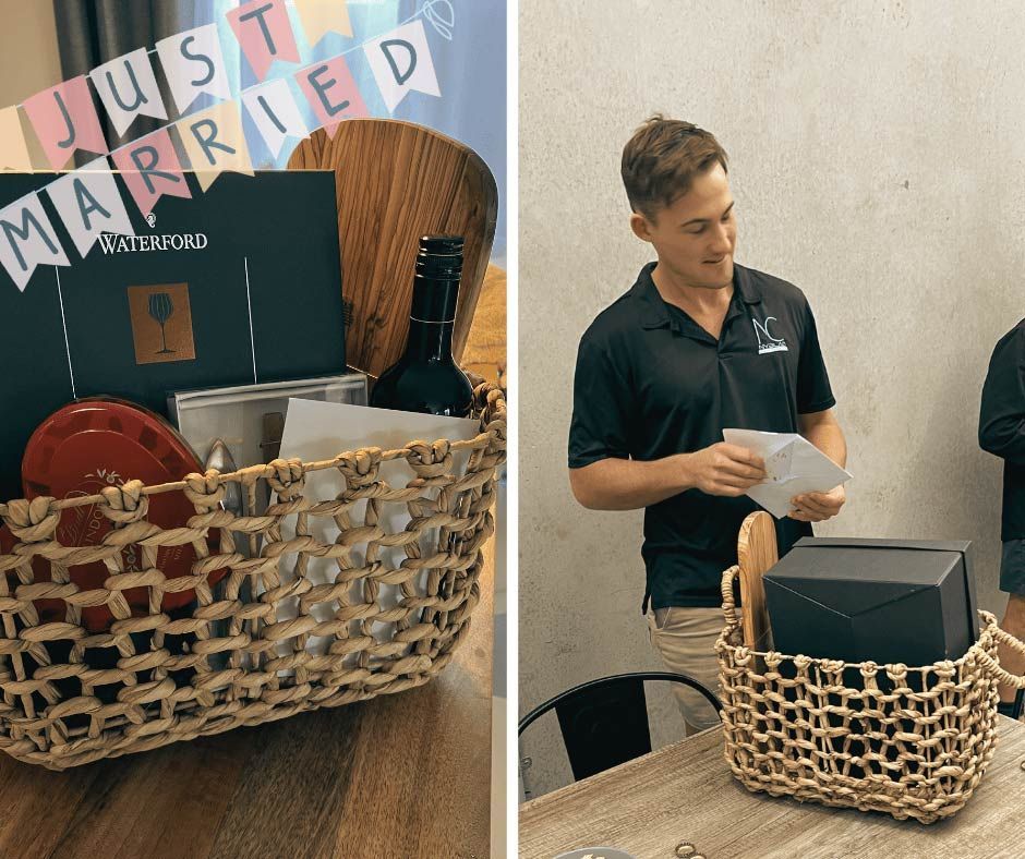 Two Men Are Standing Next To A Basket That Says Just Married — Nyblad Construction in Caloundra West, QLD