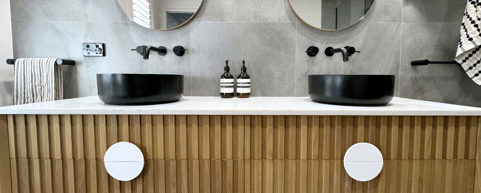 Two Black Sinks Alongside Two Stylish Mirrors — Nyblad Construction in Caloundra West, QLD
