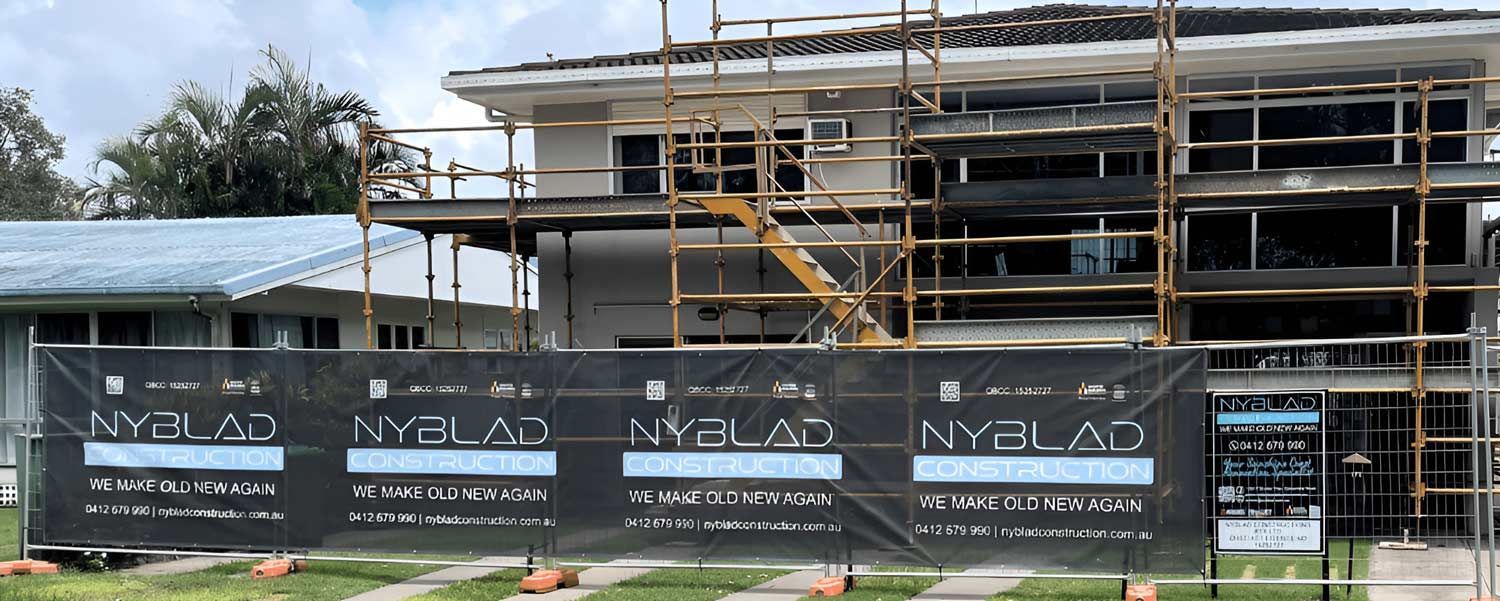 Building Is Being Built With Scaffolding Around It — Nyblad Construction in Caloundra West, QLD