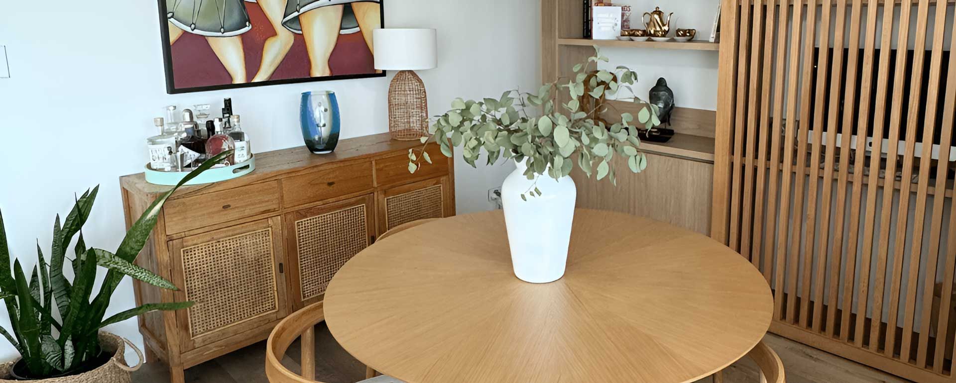  Wooden Table With A Vase Of Flowers — Nyblad Construction in Caloundra West, QLD