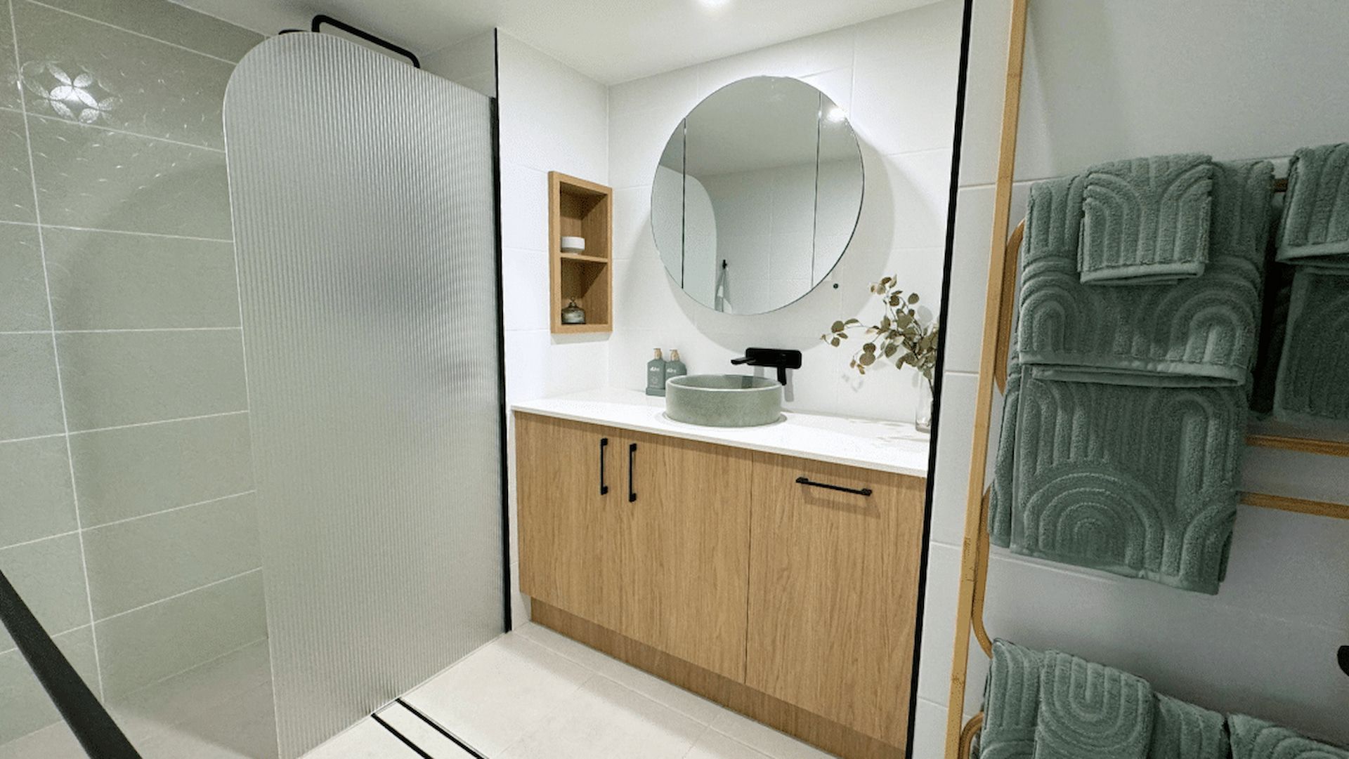 Bathroom With Tub, Sink, Mirror, and Shower — Nyblad Construction in Caloundra West, QLD