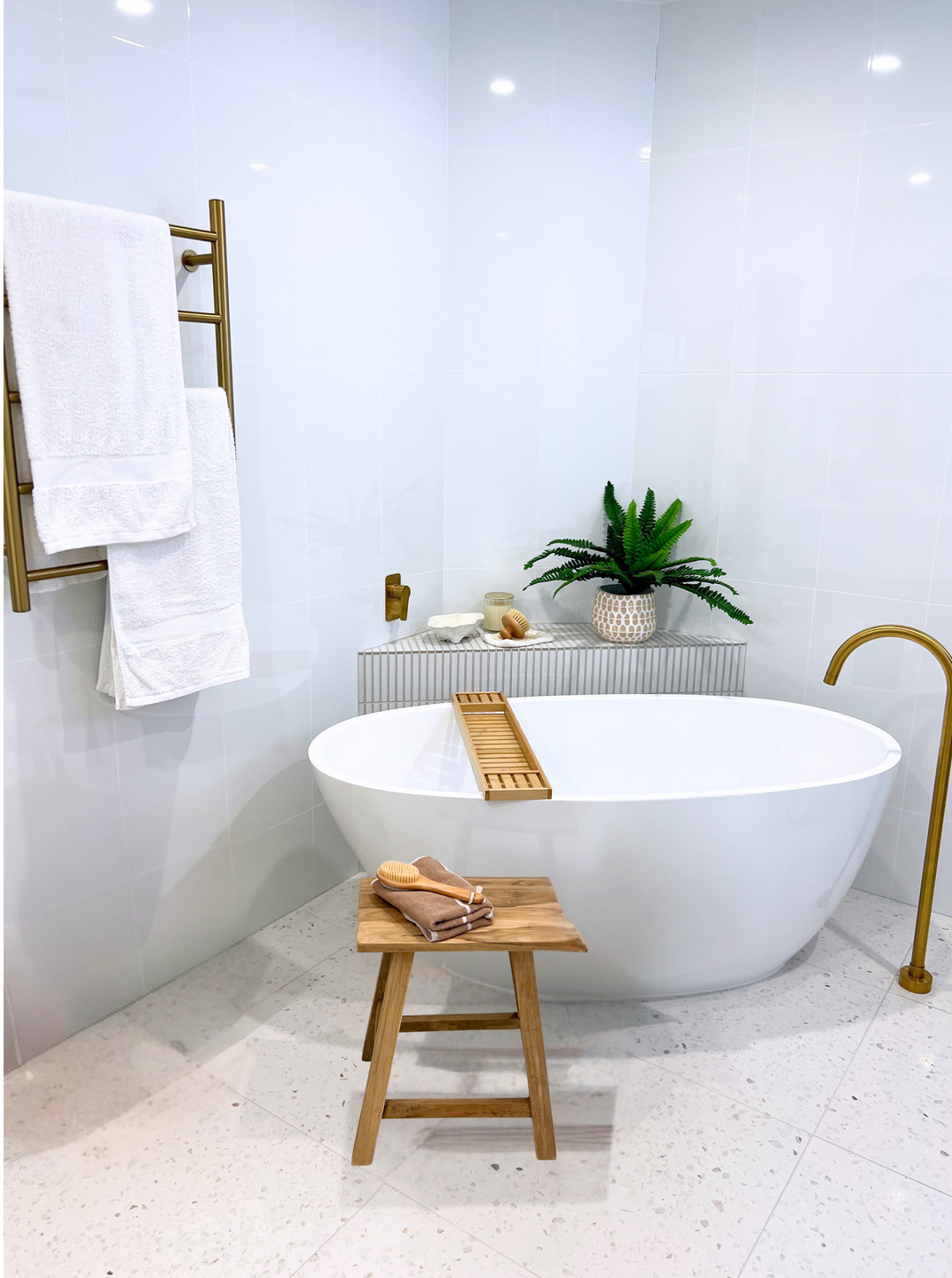 A Modern Bathroom With A Bathtub — Nyblad Construction in Caloundra West, QLD
