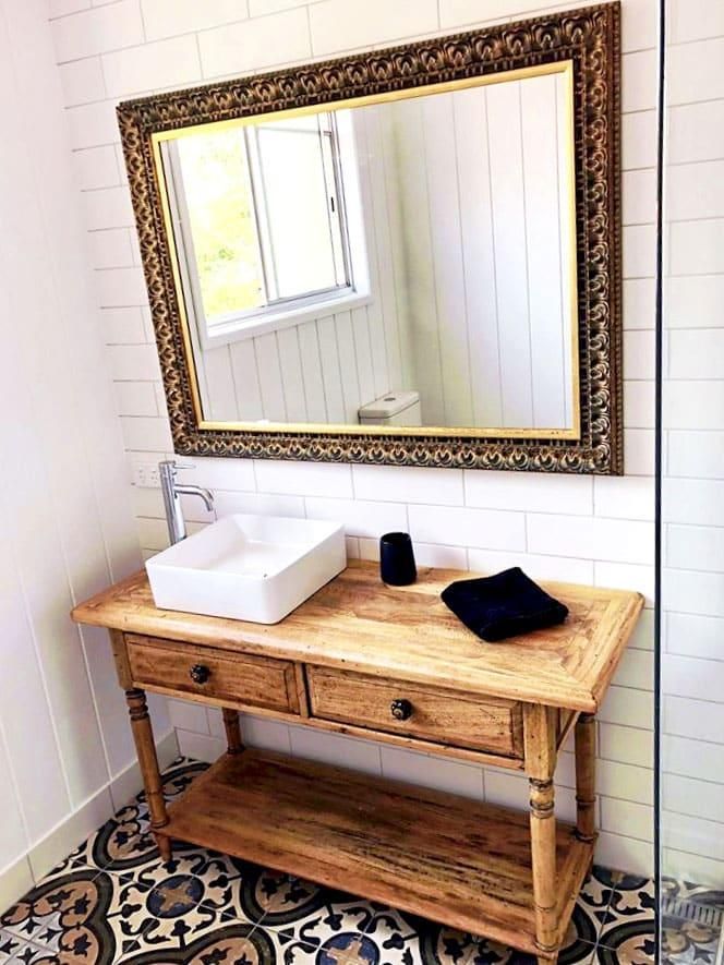 Bathroom With a Wooden Vanity — Nyblad Construction in Caloundra West, QLD