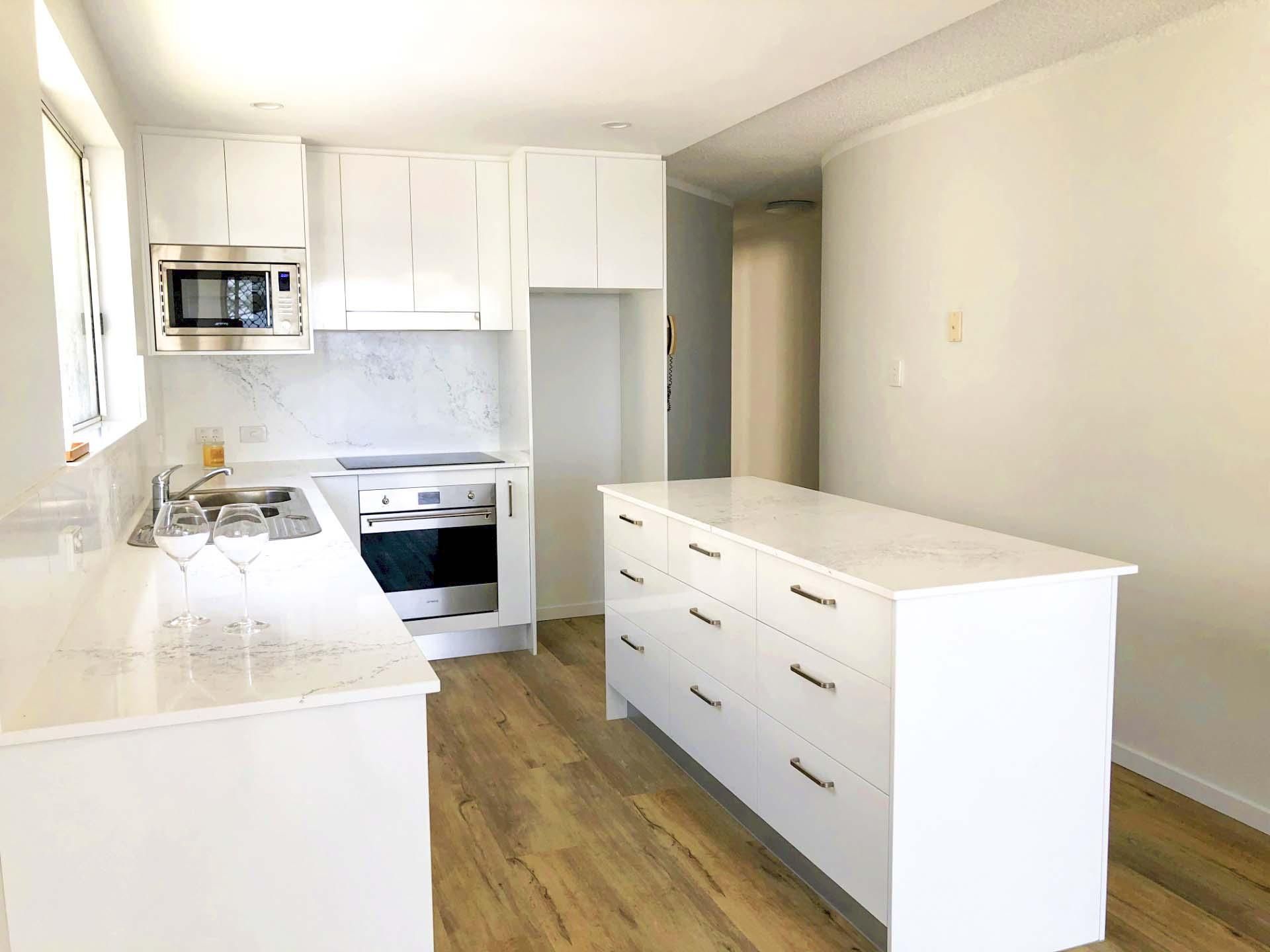 Kitchen With White Cabinets — Nyblad Construction in Caloundra West, QLD