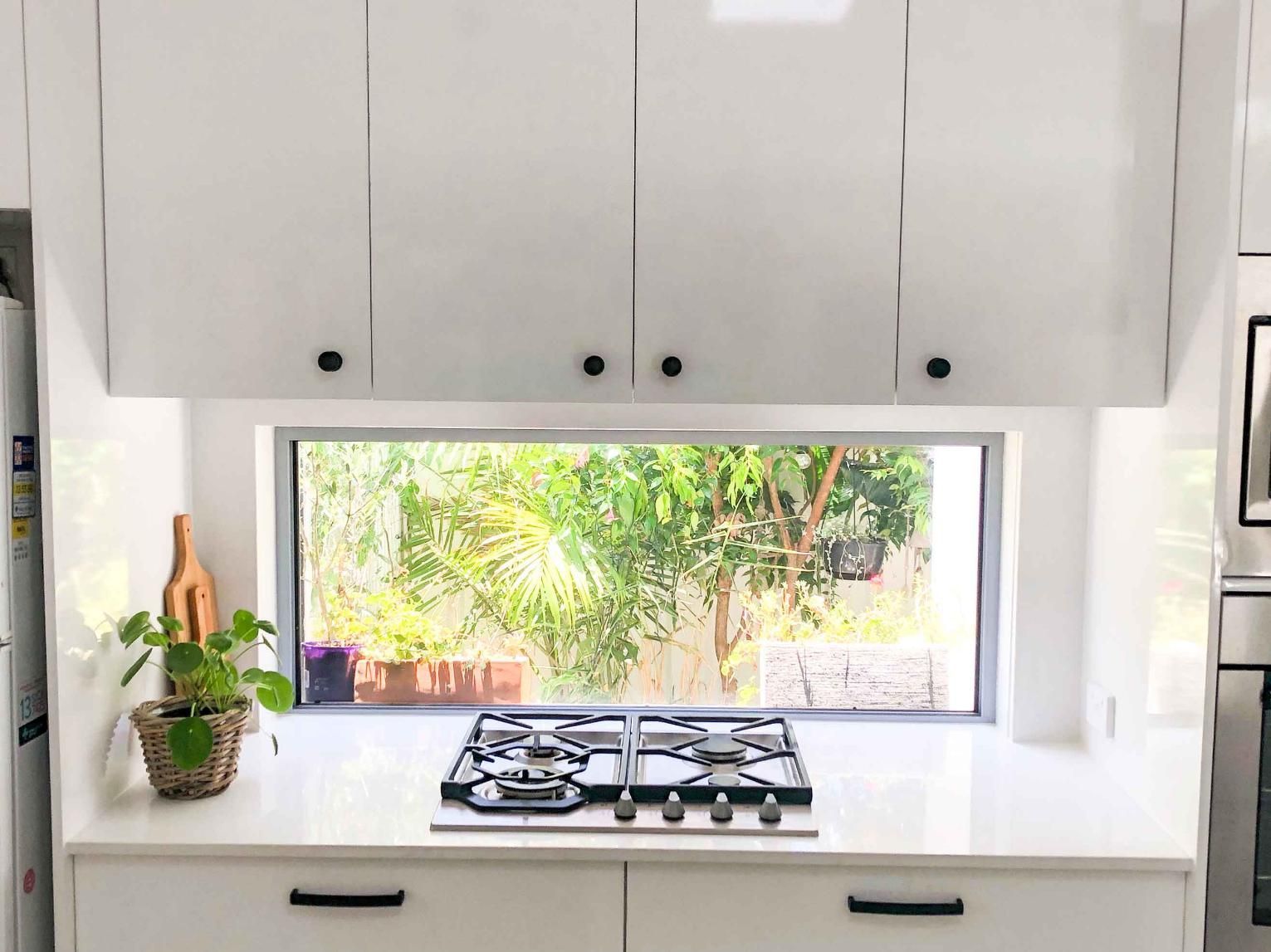 Kitchen With a Stove Top Oven — Nyblad Construction in Caloundra West, QLD