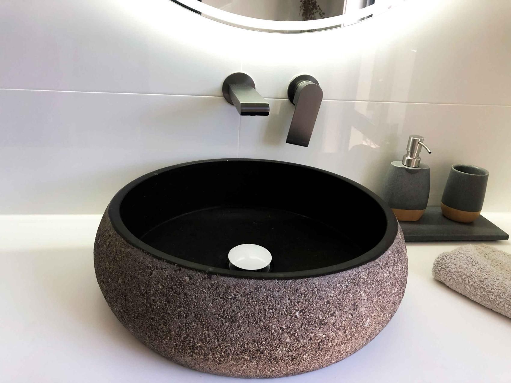 Bathroom With a Round Sink and a Mirror — Nyblad Construction in Caloundra West, QLD