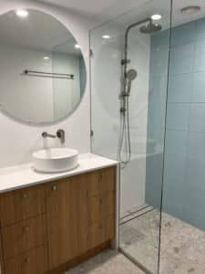 Large Round Mirror — Nyblad Construction in Caloundra West, QLD