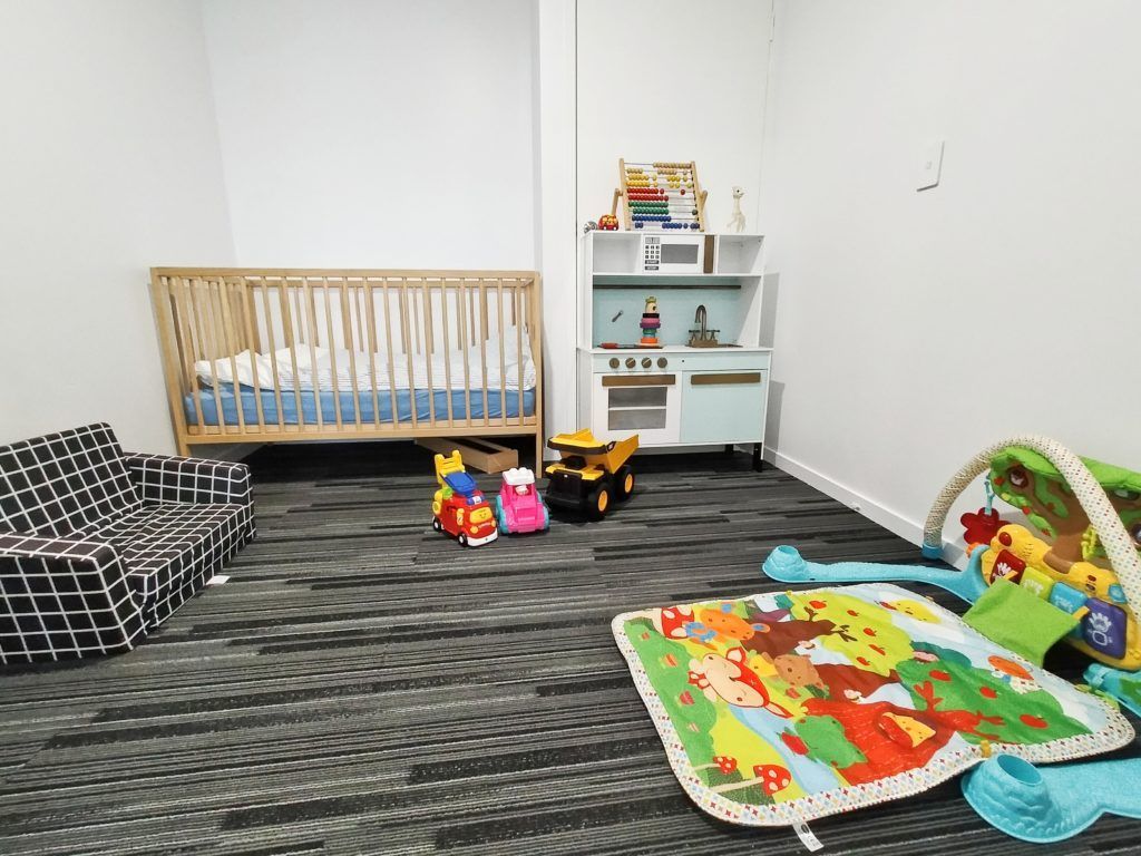 There Is A Crib And A Couch In The Room — Nyblad Construction in Caloundra West, QLD